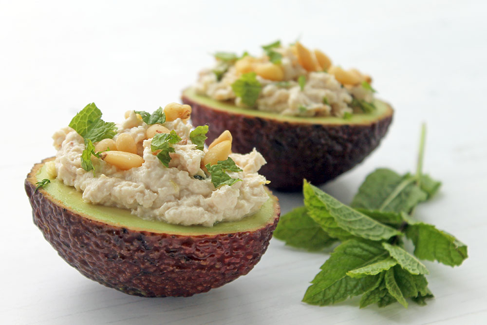 Chicken Avocado Boats With Minted Tahini Yogurt And Pine Nuts