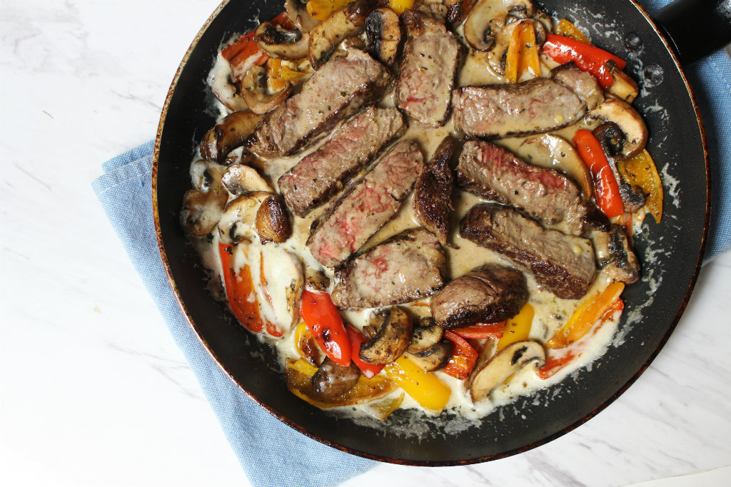 Steak Medallions In Asiago Cream Sauce with Peppers And Mushrooms