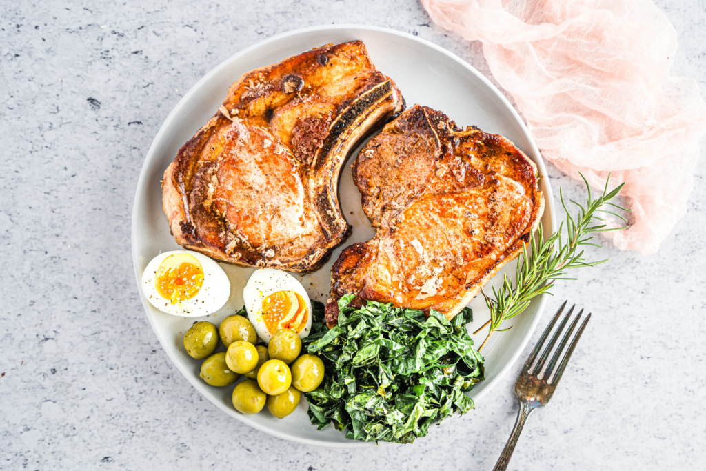 OMAD Rosemary Pork Chop with Buttered Kale