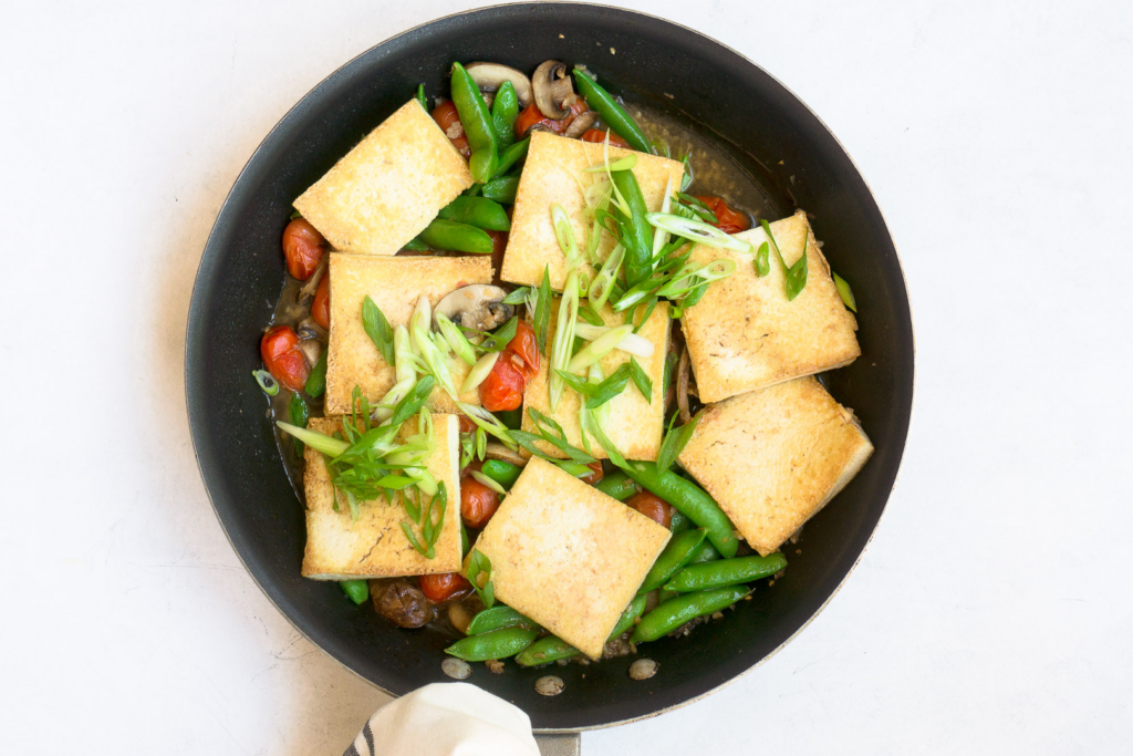 Asian Seared Tofu With Burst Cherry Tomatoes And Peas